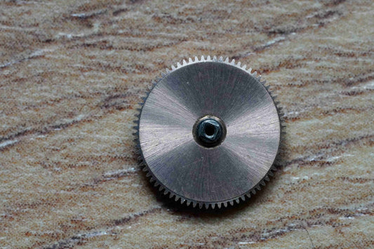 Omega cal 710 part 1200R Barrel with arbor & mainspring brass