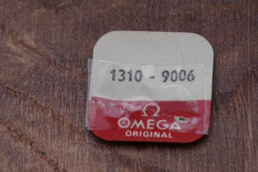 Omega cal 1310 part 9006 in setting for center second wheel