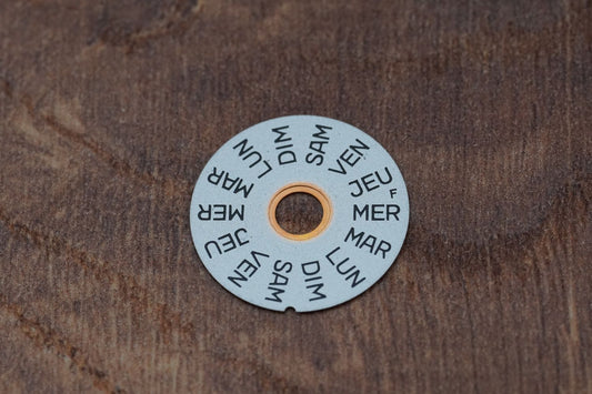 Omega cal 1310 part 9067 day indicator (FR)