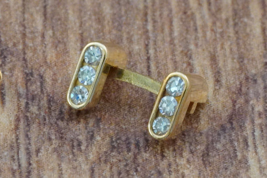 Omega Bezel claw 18ct gold with diamonds