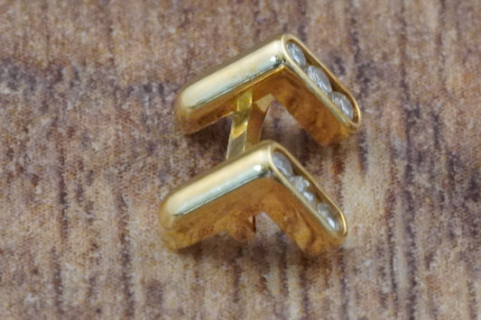 Omega Bezel claw 18ct gold with diamonds