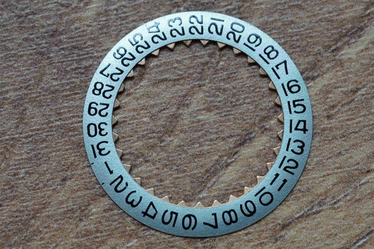 Omega cal 560 part 1500A Date indicator silver